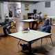 A group of men social distance at a cooling center as temperatures rise amid the pandemic on May 6, 2020, in Los Angeles.